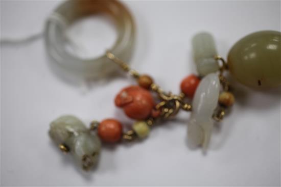 A collection of Chinese gold mounted jade and coral carvings and beads, Qing dynasty, total length 10.5cm